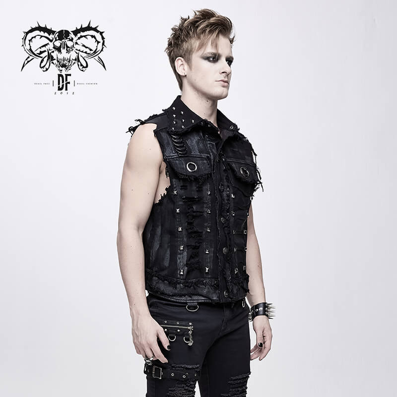 Stylish male model in black steampunk waistcoat with silver rivets, showcasing a modern edgy fashion statement.