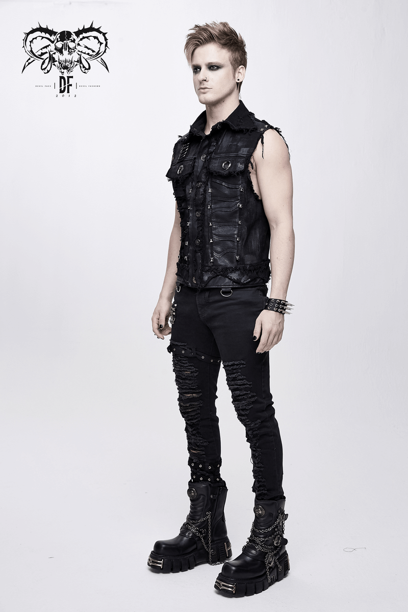 Stylish male model in a black steampunk vest with rivets and edgy fashion, showcasing modern gothic vibes.