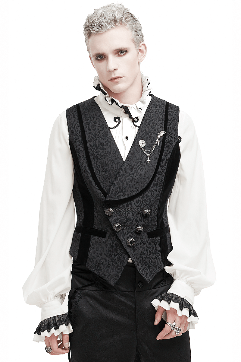 Gothic style male model wearing a black jacquard waistcoat with patterned buttons and a stylish ruffled shirt.