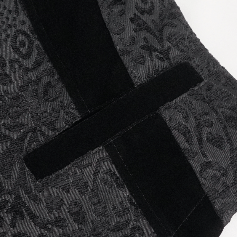 Close-up of the intricate black jacquard pattern on a men's gothic waistcoat, showcasing stylish detailing.