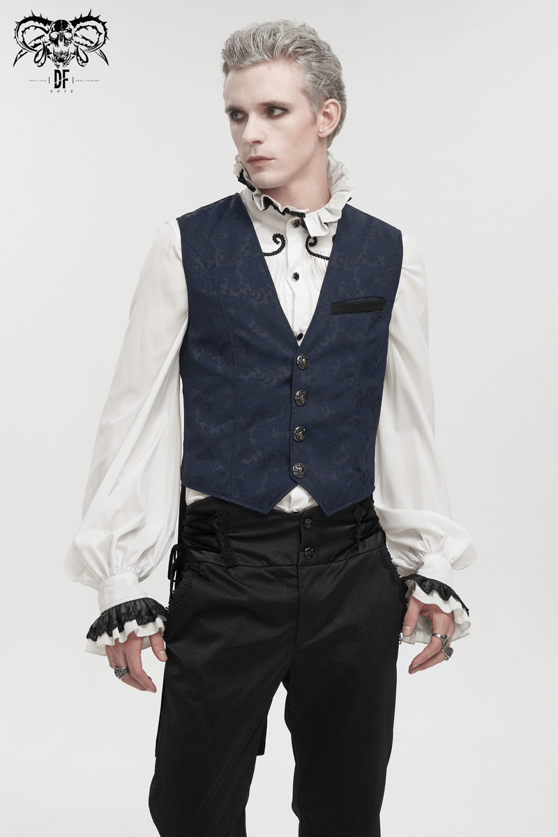 Elegant male model in blue gothic tailed waistcoat with engraved buckle, showcasing unique fashion style.