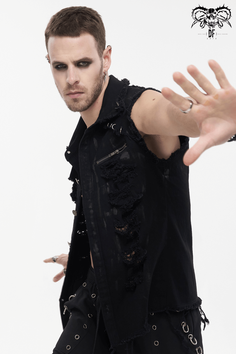 Male model showcasing a punk-style black sleeveless shirt with metal decoration and distressed details.