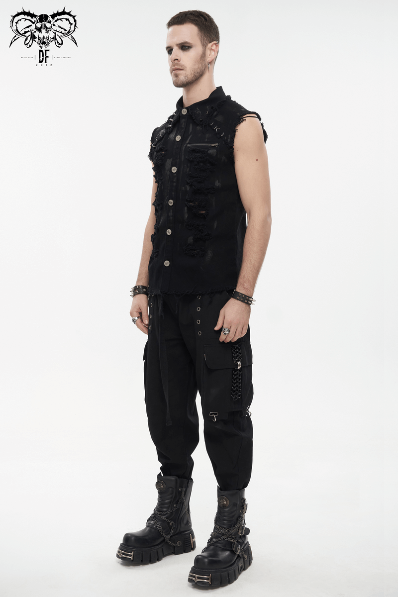 Male model showcasing a black distressed sleeveless punk shirt with metal accents.