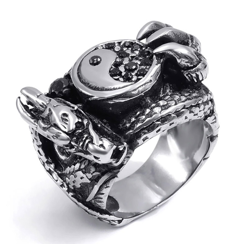 Stylish men's stainless steel dragon claw ring, combining alternative fashion with a yin-yang design.