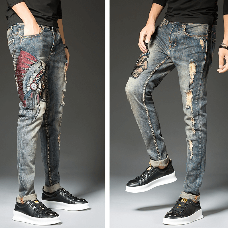 Stylish men's ripped embroidery denim jeans featuring trendy tribal designs and a slim fit for alternative fashion.