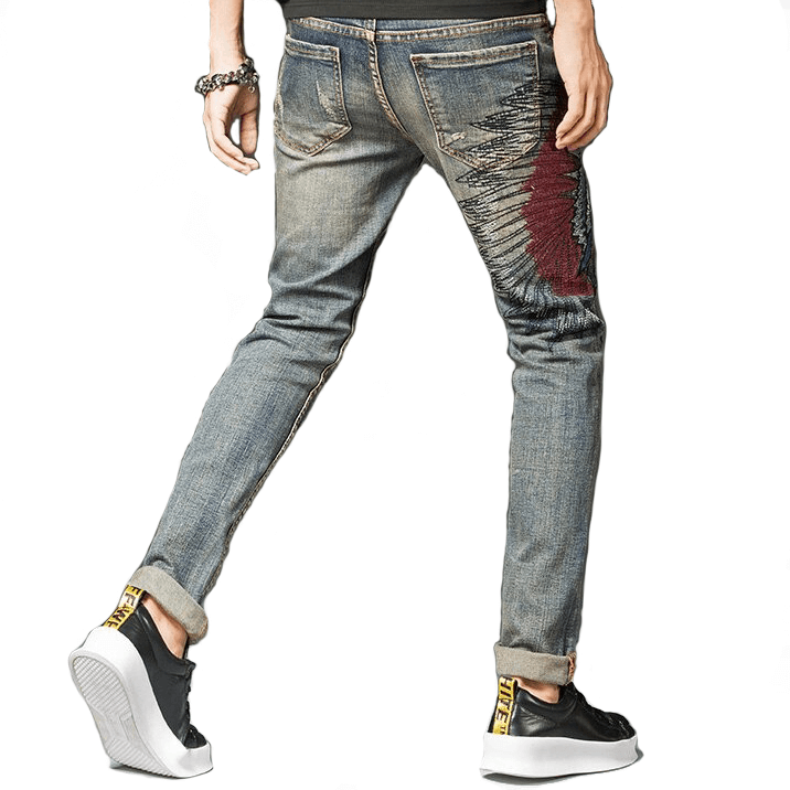 Stylish men's denim jeans with embroidery, featuring a trendy slim fit and alternative fashion appeal.