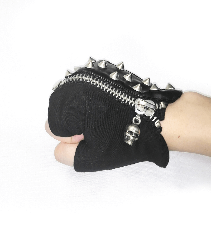 Punk style black fingerless gloves with silver spikes and zipper detail, perfect for a trendy men's accessory.