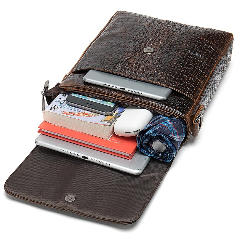 Men's genuine leather shoulder bag in crocodile pattern, showcasing stylish storage for everyday essentials.