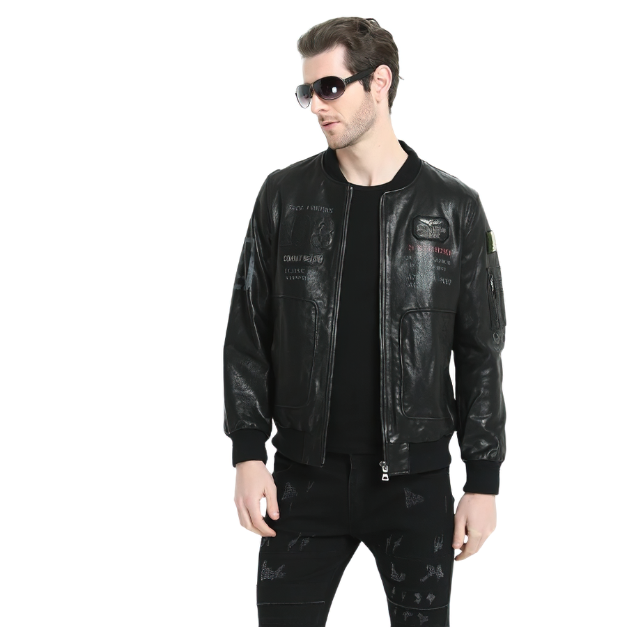 Stylish male in a black genuine leather biker jacket with sunglasses, showcasing a modern urban look.