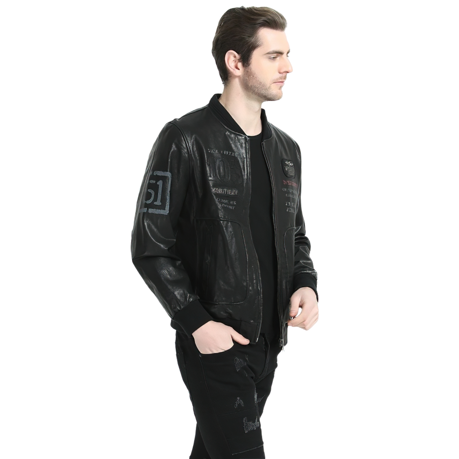 Stylish male model wearing a genuine black leather biker jacket with printed details, perfect for casual outings.