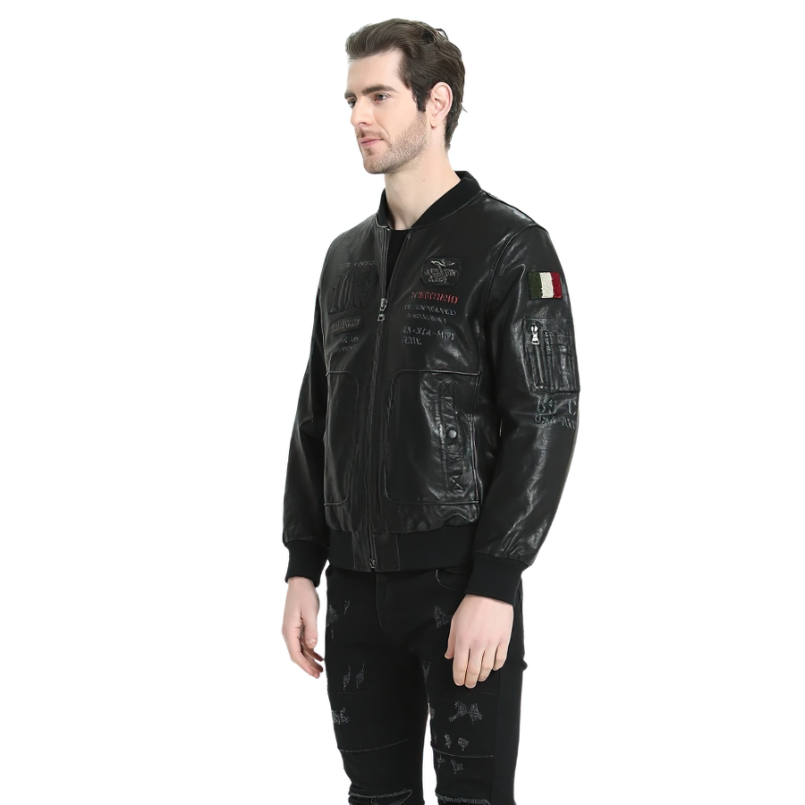 Stylish male in a black genuine leather biker jacket with detailed prints, perfect for a fashionable look.