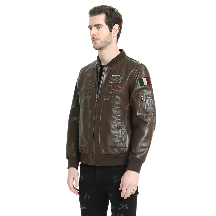 Stylish male biker leather jacket in brown, featuring decorative patches and a zip-up front.