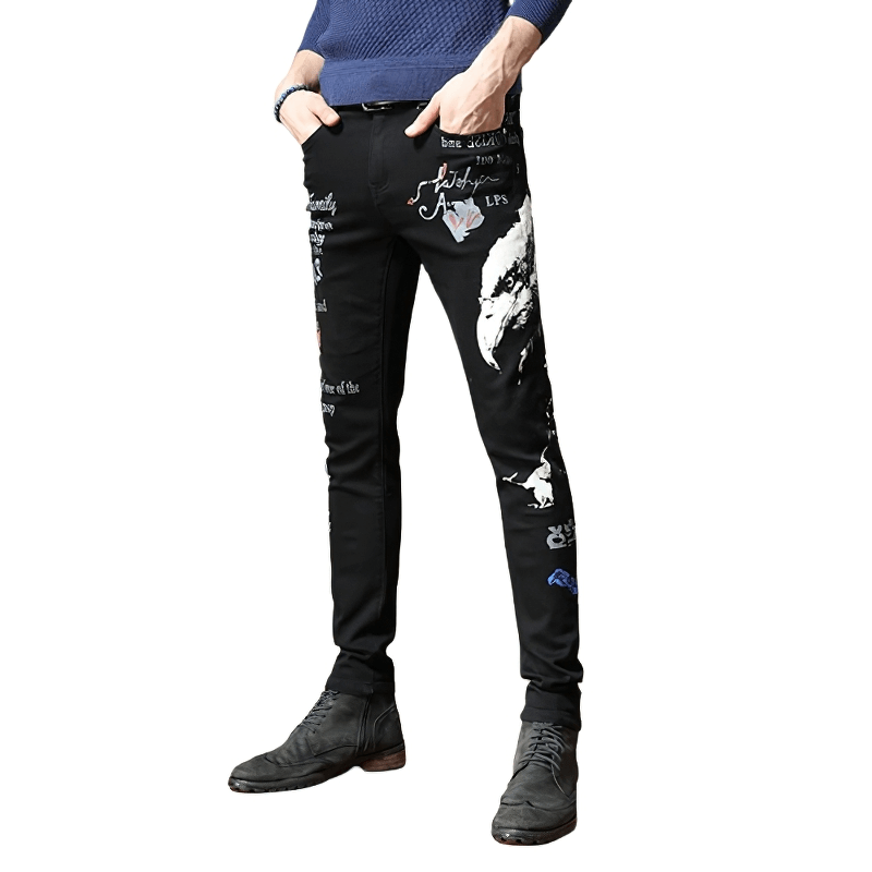 Men's black denim graffiti pants with unique print, showcasing alternative style for trendy casual wear.