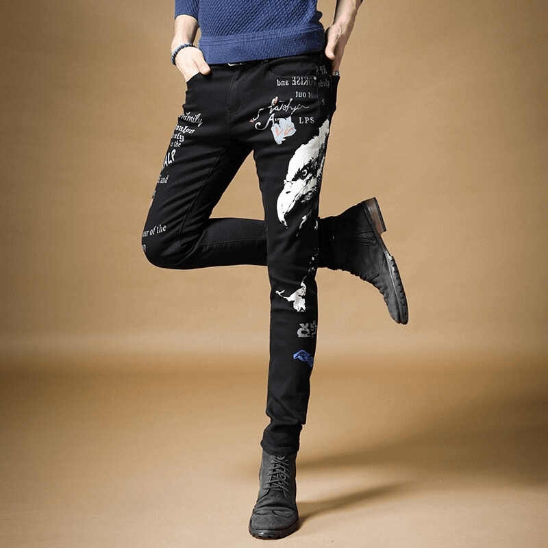 Men's black denim graffiti pants in alternative style, featuring unique designs for a trendy look.