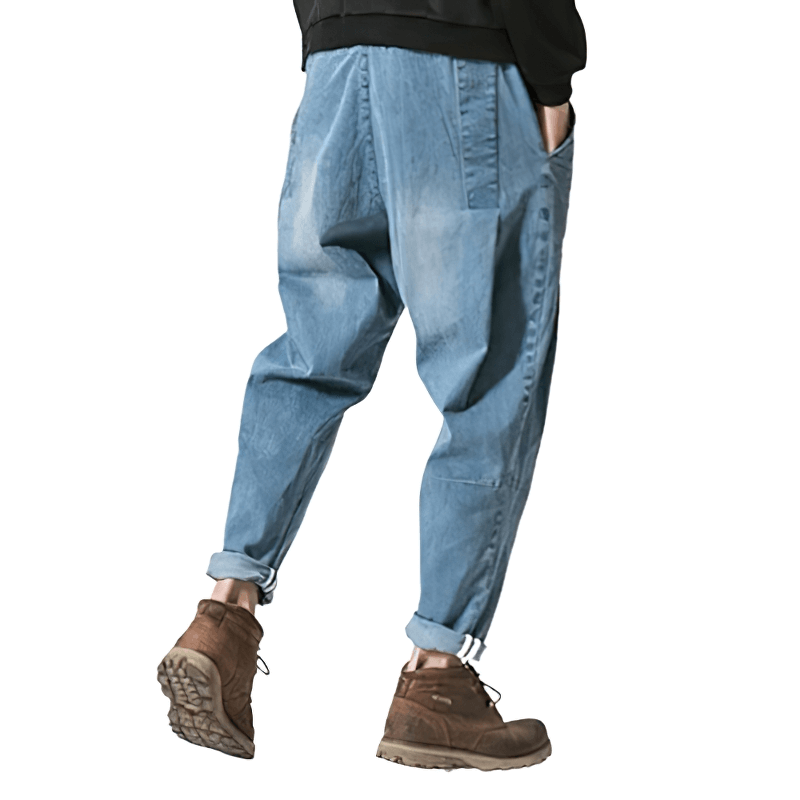 Stylish male loose denim pants with belt, perfect for casual wear in trendy blue color.