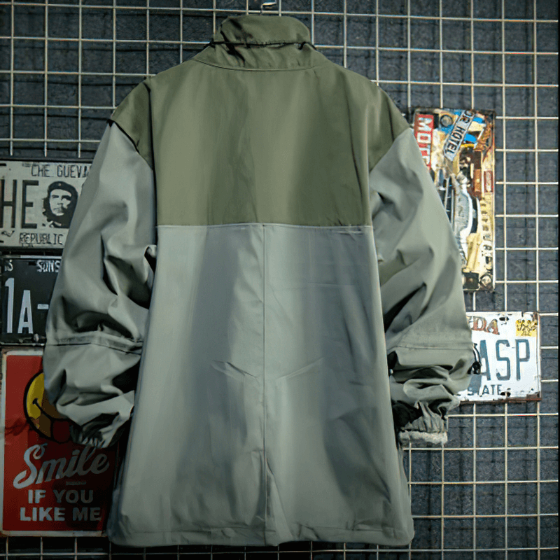 Back view of male patchwork stand collar jacket in green and gray, featuring a loose fit and stylish design.