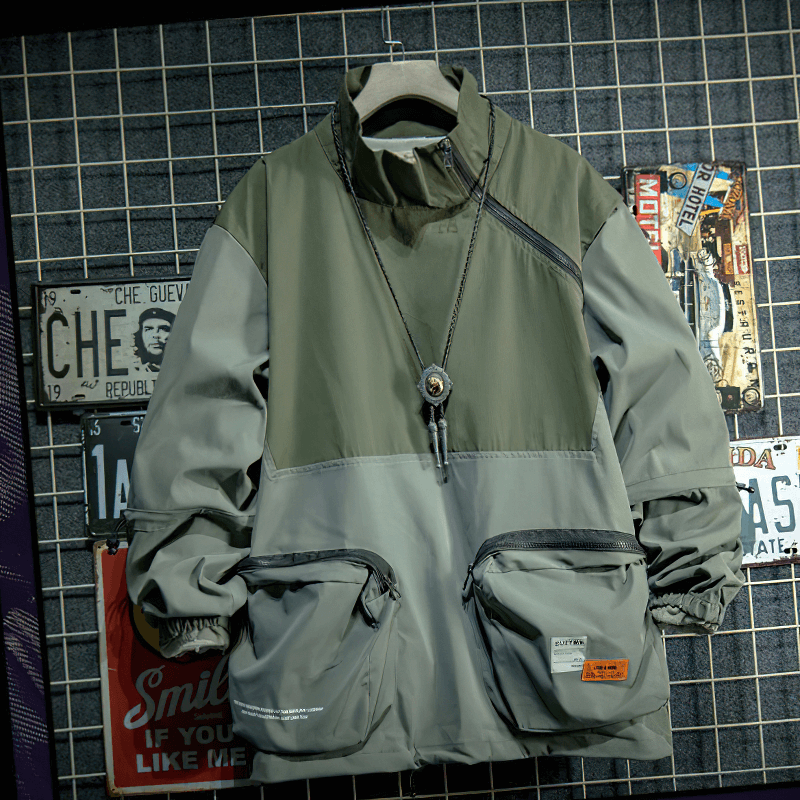 Men's loose patchwork jacket with stand collar and multi pockets, perfect for outdoor casual style.