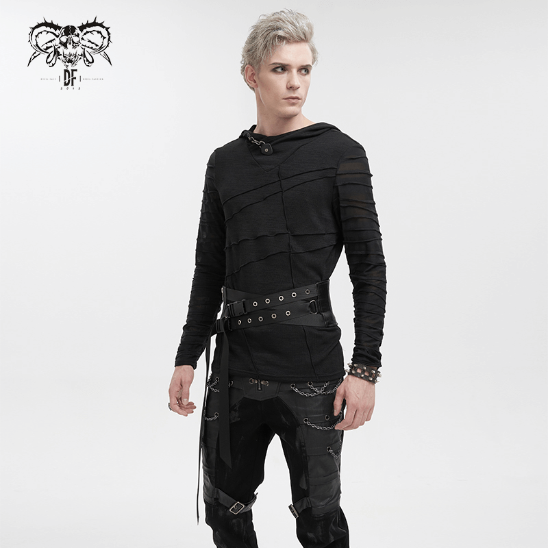 Stylish male model in alternative punk fashion, wearing a black layered hoodie and eyelet buckled belt.