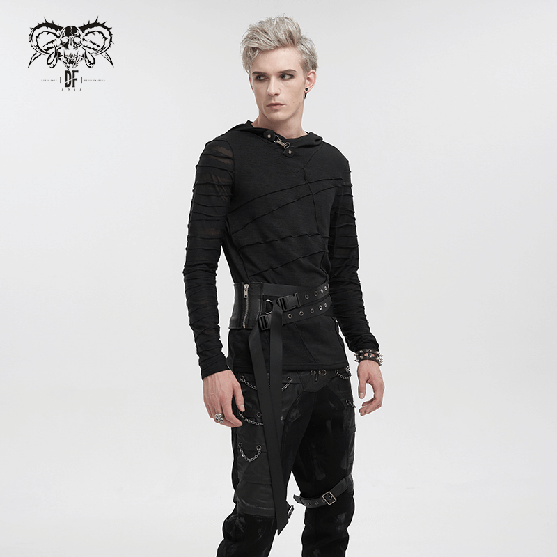Male model wearing a punk eyelet buckled decussate belt with a stylish black hoodie and pants, showcasing alternative fashion.