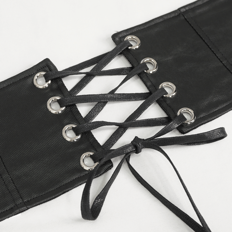 Close-up of a black punk belt with eyelets and crisscross lacing, showcasing its bold alternative style.