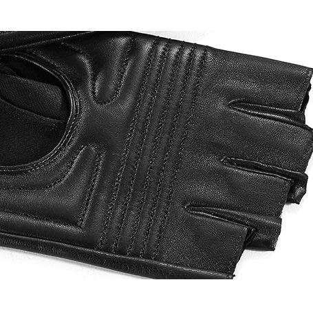 Close-up of black leather fingerless gloves, perfect accessory for punk style outfits.