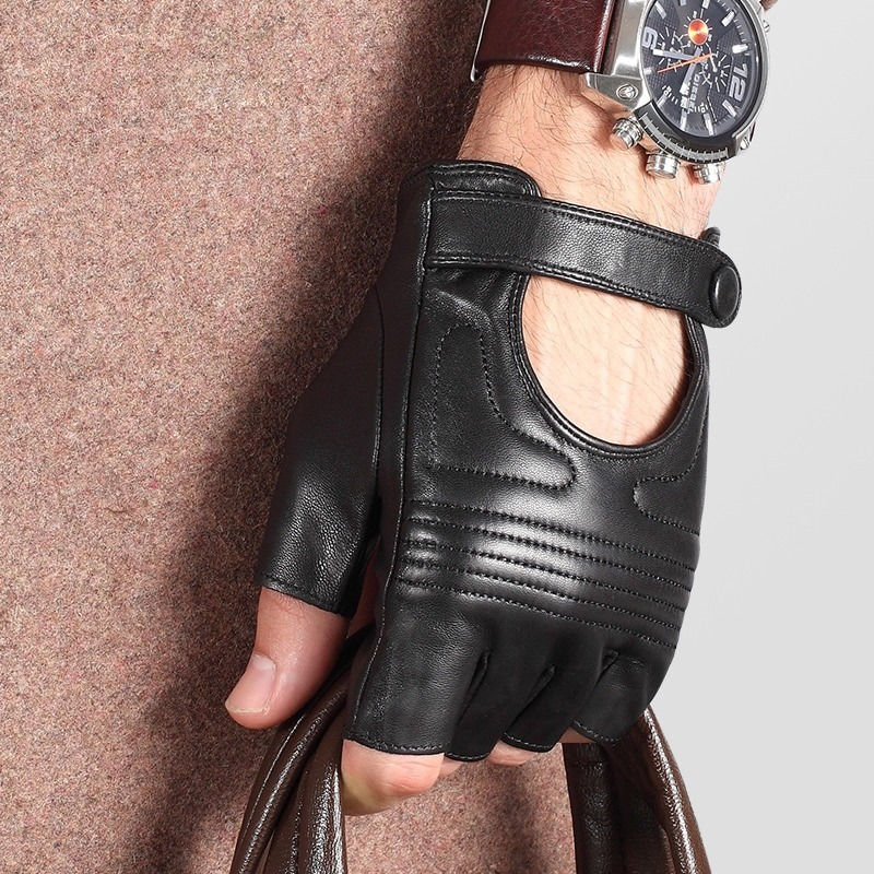 Stylish male in black leather fingerless gloves showcasing punk fashion accessories.
