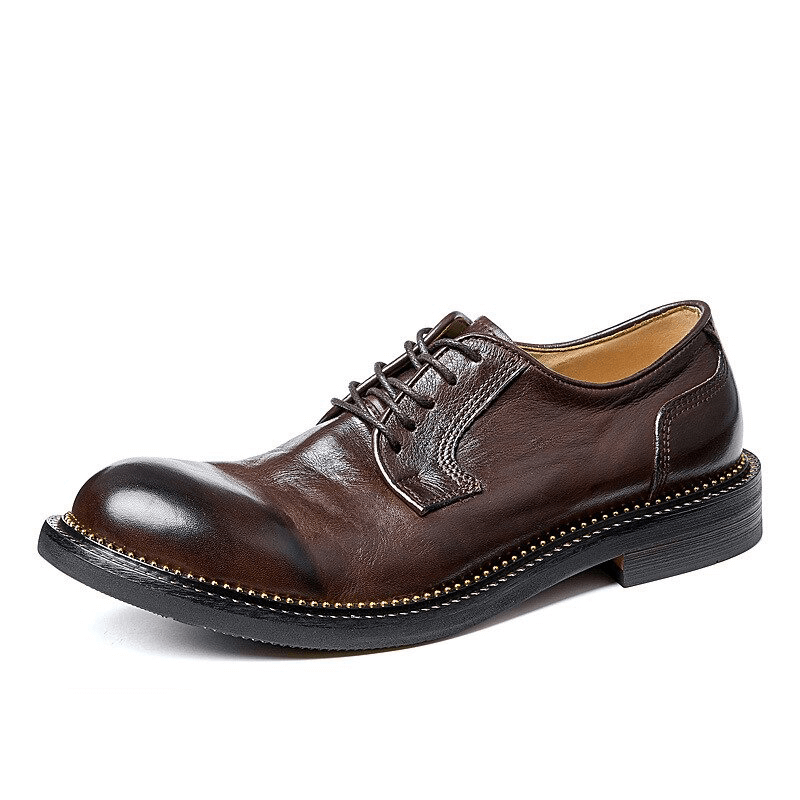 Elegant brown leather Oxford shoe, retro style with soft lace-up design, perfect addition to men's casual footwear.