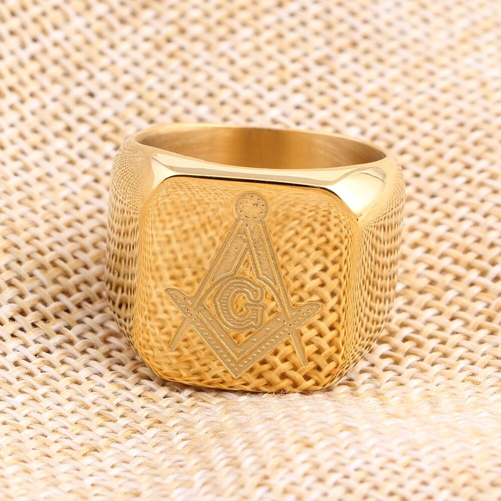 Elegant gold Masonic signet ring with unique geometric design and symbol, perfect for unisex punk fashion.