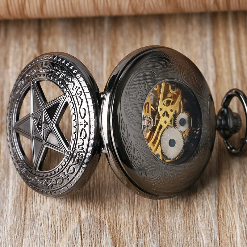 Mechanical black pocket watch with pentagram design, showcasing intricate golden gears, perfect for alternative fashion.