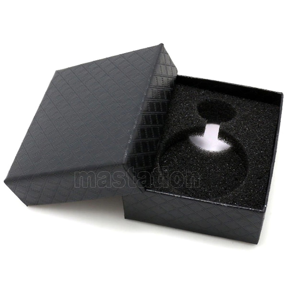 Elegant black gift box for jewelry with a cushioned interior, perfect for presenting rings or special gifts.