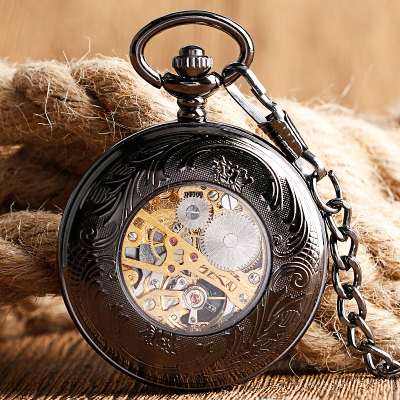 Mechanical pocket watch with intricate engravings and visible gears, perfect for vintage style lovers.