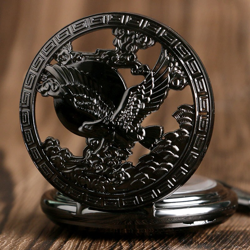 Intricate black mechanical pocket watch featuring a flying eagle design, a stylish accessory for any occasion.