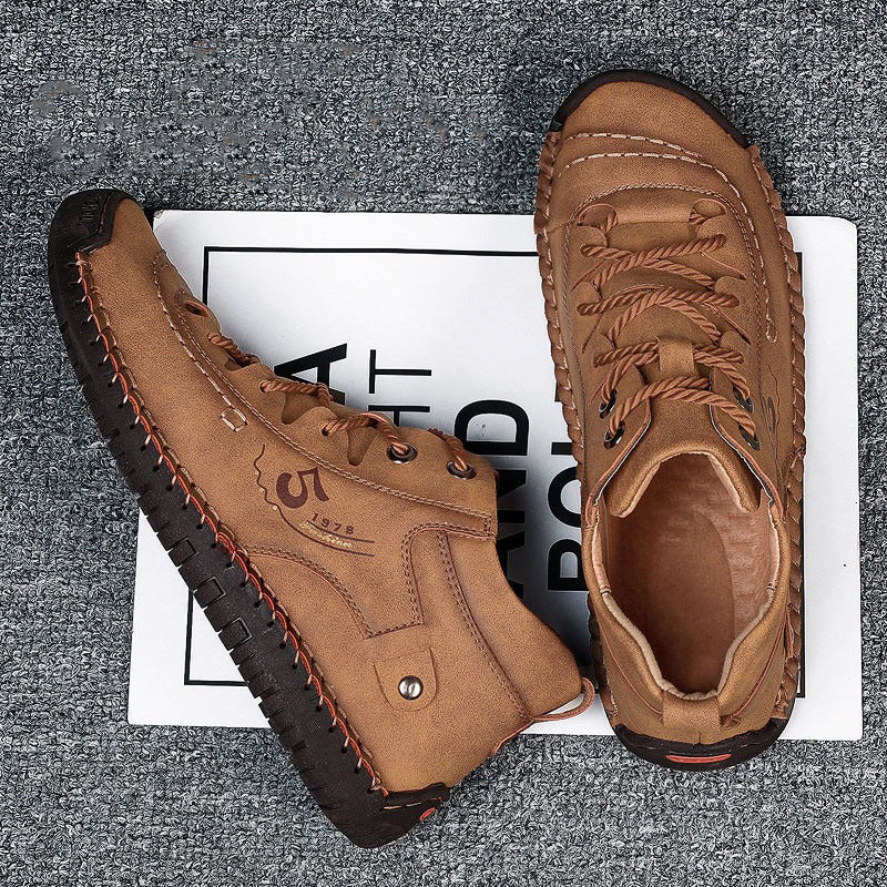 Men's stylish split leather ankle boots with plush lining and rubber sole, perfect for winter fashion.