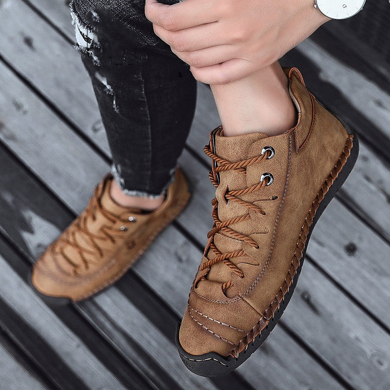 Men's split leather ankle boots with plush lining and rubber sole, perfect for a bold winter style.