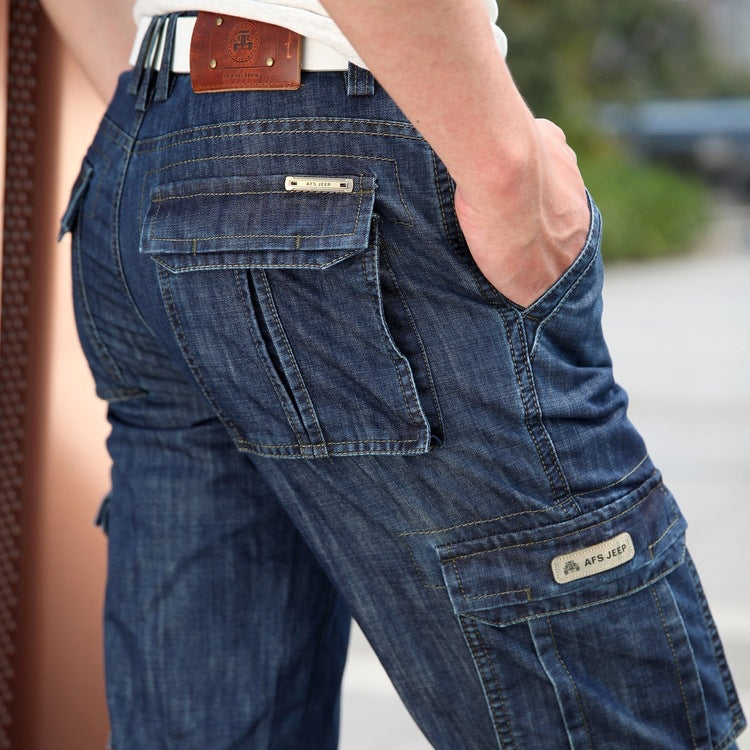 Casual men's cargo jeans featuring a stylish multi-pocket design in dark denim, perfect for grunge outfits.