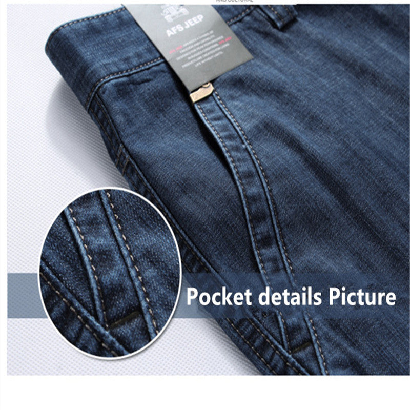 Close-up of pocket details on men's cargo jeans showcasing high-quality stitching and casual style.