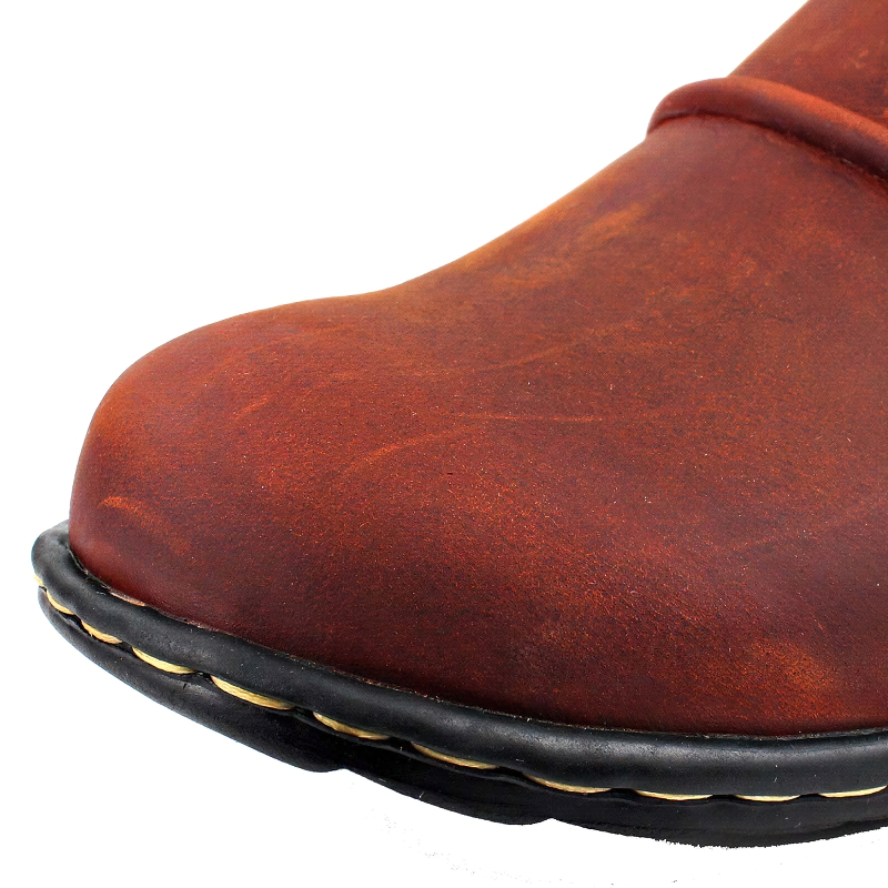 Close-up of men's casual leather boot, highlighting rich brown color and stylish design elements for rock fashion enthusiasts.