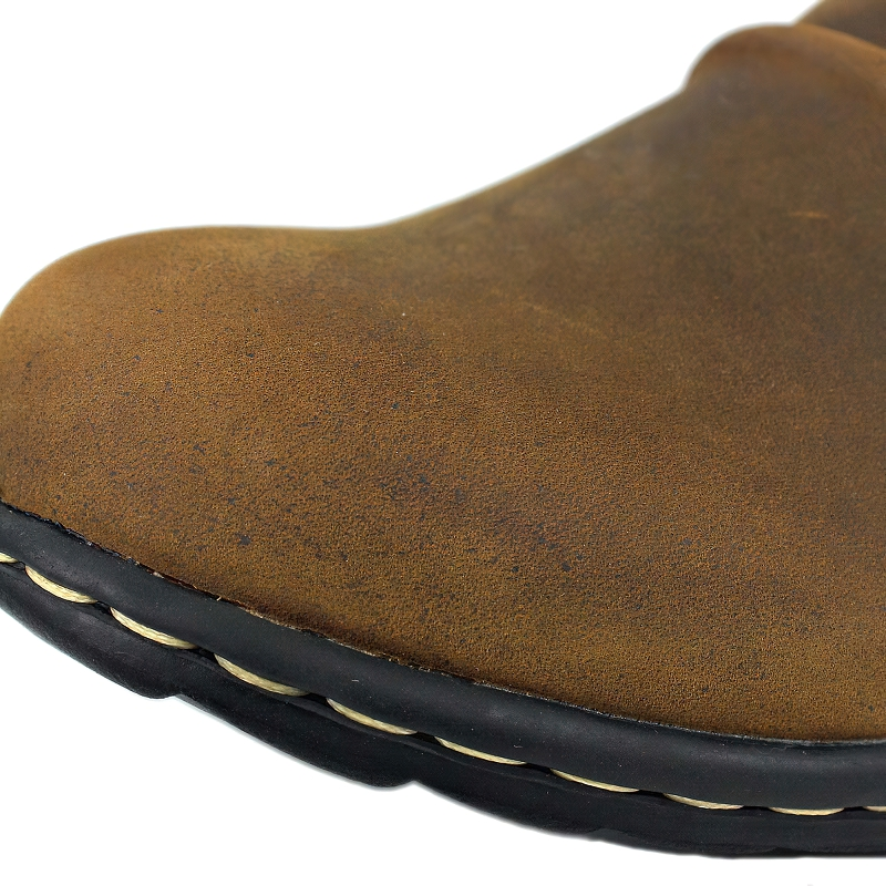 Close-up of men's casual leather boot showcasing stylish design and durable material in a rich brown color.