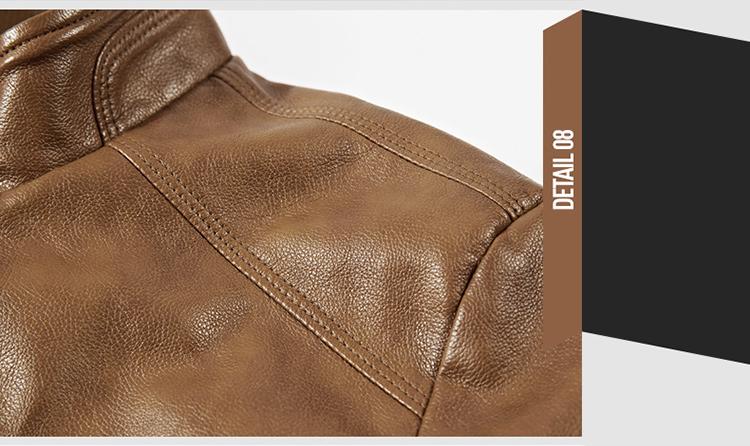 Close-up of the brown imitation leather of a men's biker motorcycle jacket, highlighting the texture and stitching details.