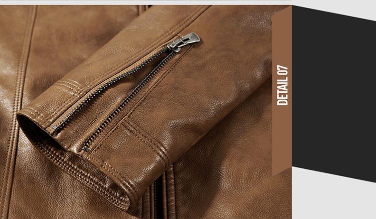 Close-up of men’s brown biker jacket zipper detail, showcasing quality stitching and stylish design elements.
