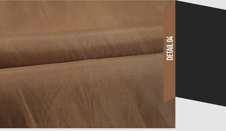 Close-up of brown imitation leather fabric for men's casual biker jackets, showcasing texture and quality.