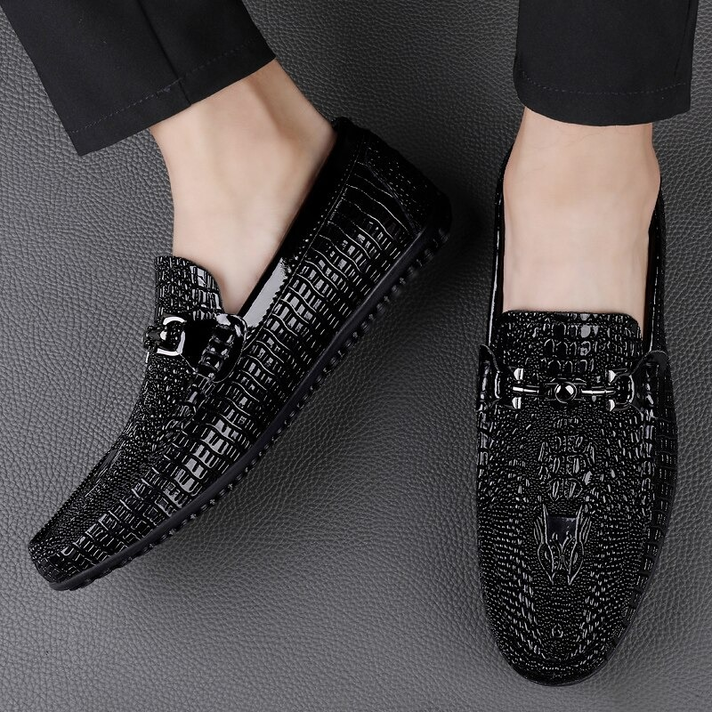 Stylish black crocodile pattern loafers for men, featuring a sleek design and comfortable fit, perfect for any occasion.