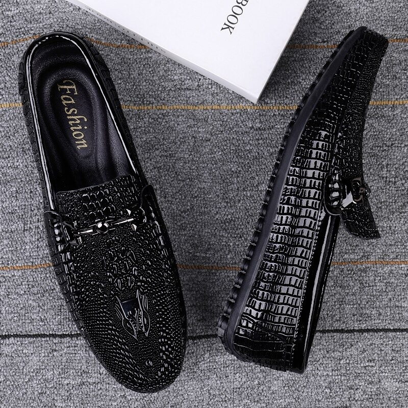 Black gothic men's leather loafers with textured design and rubber sole, perfect for stylish comfort.