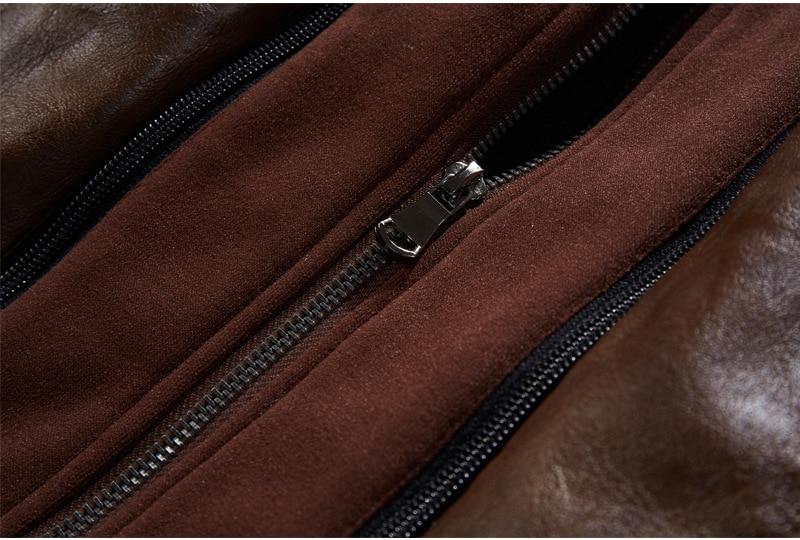 Close-up of a zippered section of a men's motorcycle leather jacket in rich brown tones.