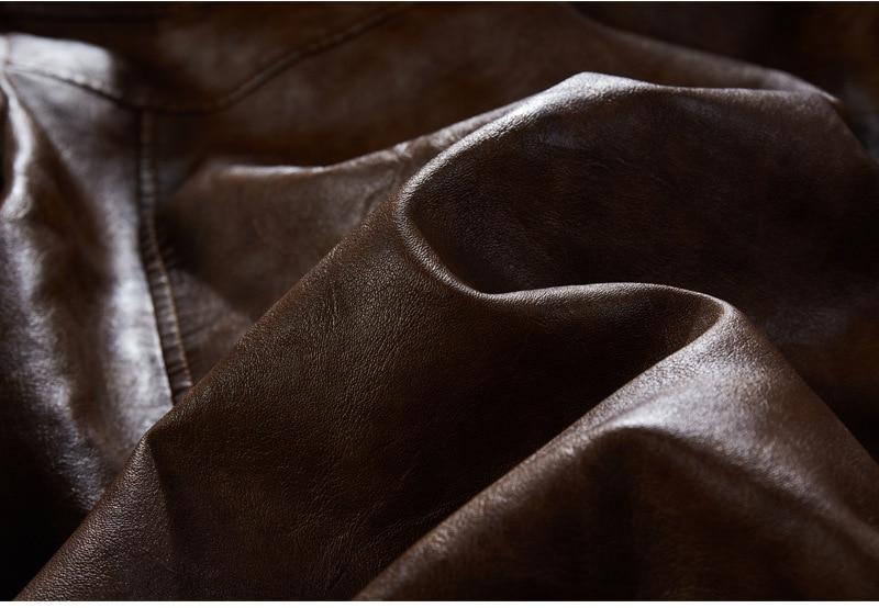 Close-up of luxurious brown synthetic leather fabric, perfect for men's motorcycle jackets and stylish outerwear.
