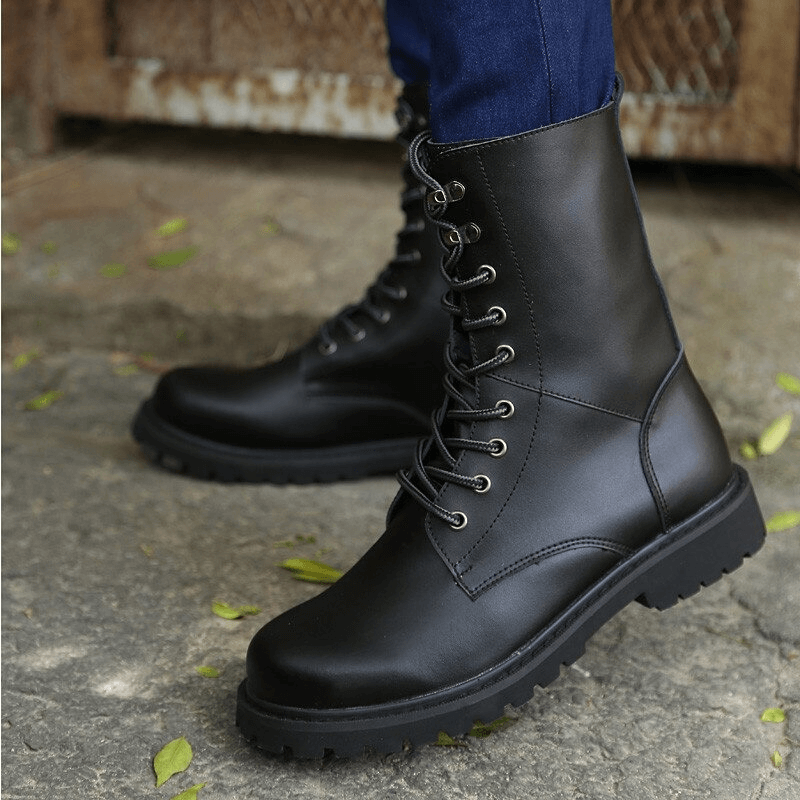 Men's black combat boots featuring lace-up design and mid-calf style, perfect for casual wear and tactical adventures.