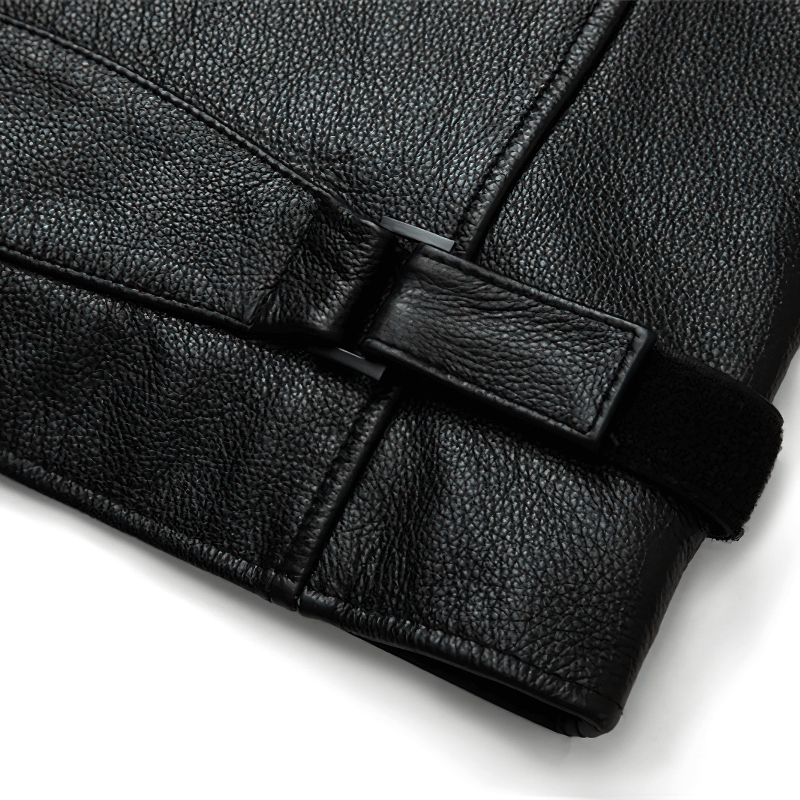 Close-up of the adjustable strap detail on a men's black genuine leather motorcycle jacket.