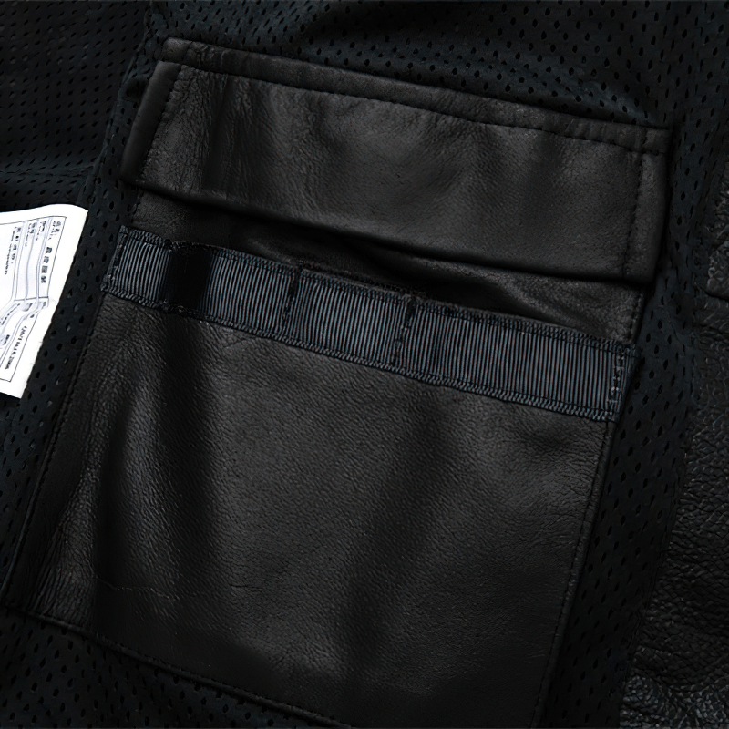 Interior view of a men's black leather jacket pocket, showcasing stylish design and durable materials.