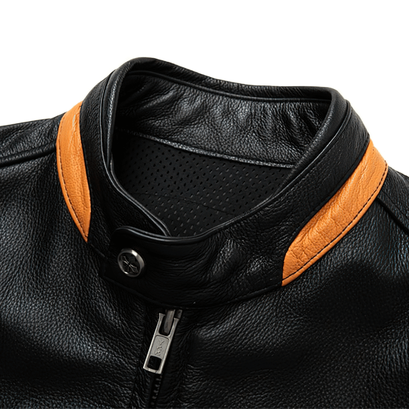Close-up of the stylish collar of a men's black leather motorcycle jacket with contrasting orange detail.