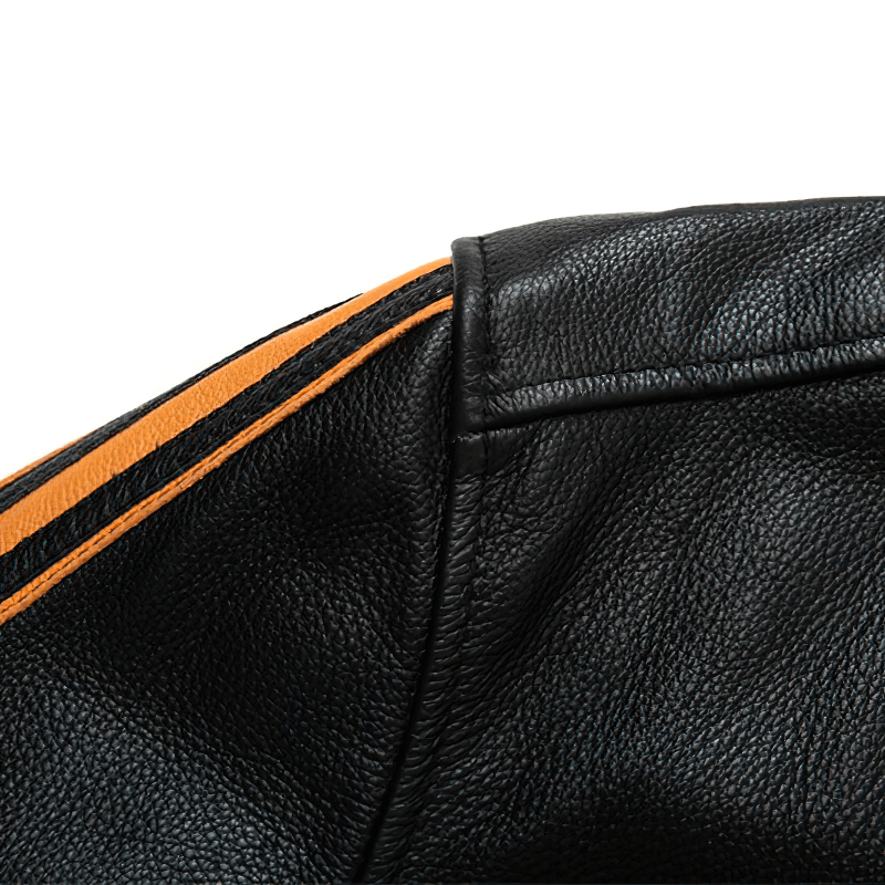 Close-up of a men's black genuine leather jacket shoulder with orange stripe detailing.